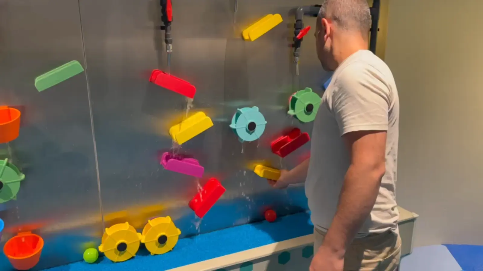 Magnetic channels and spinning wheels on the water wall