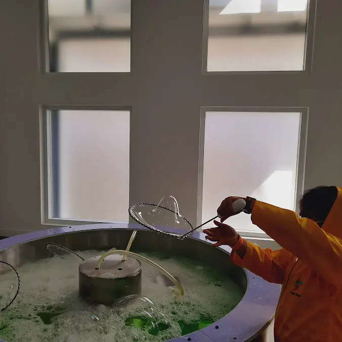Children experimenting with bubble wands