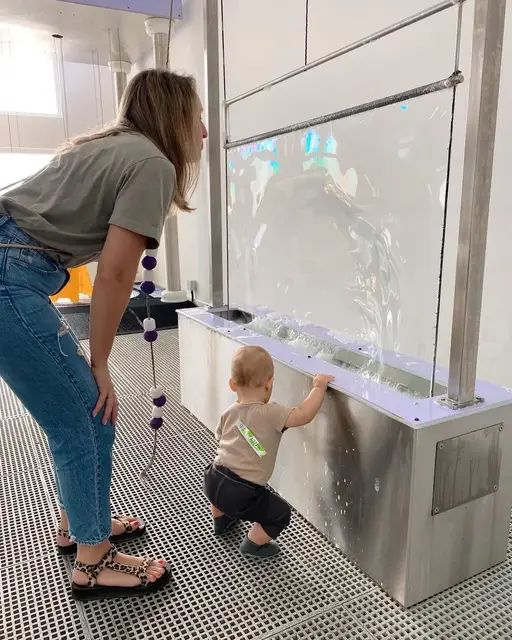 Giant iridescent soap film curtain